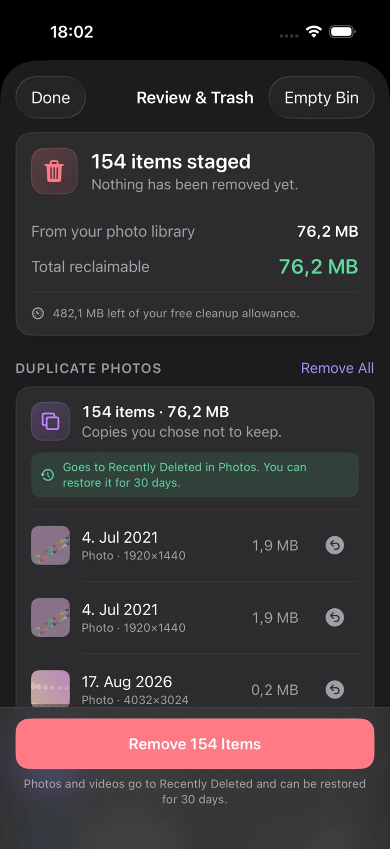 The Review & Trash screen: 154 items staged, nothing removed yet, 76.2 MB total reclaimable, 482.1 MB left of the free cleanup allowance, each staged item listed with an individual undo, and a note that removed photos go to Recently Deleted for 30 days.